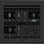 Boîtier de table motorisé Crestron FT2-700 intégré dans une salle de réunion connectée pour la connectique HDMI, USB-C et réseau.