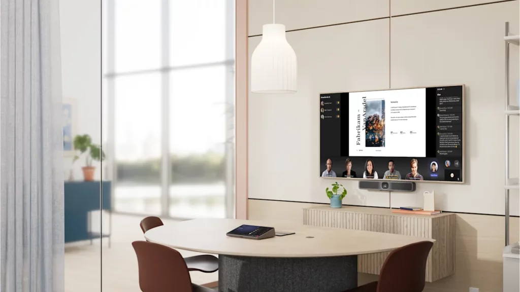 Salle de réunion équipée d’un système Microsoft Teams Rooms installé par Ageda Communication à Genève.